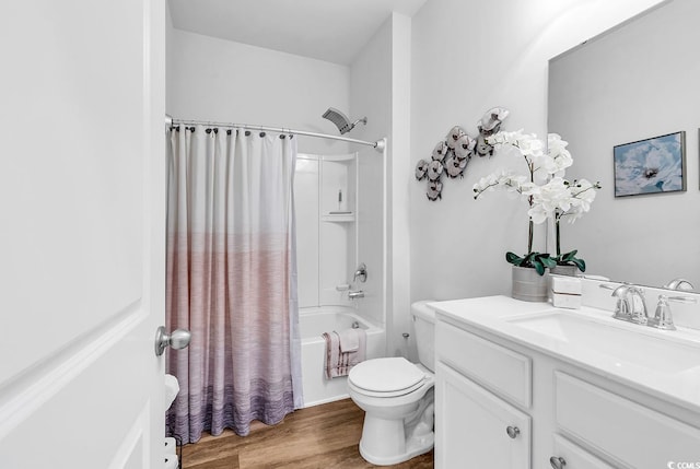 full bathroom with shower / bathtub combination with curtain, wood-type flooring, toilet, and vanity