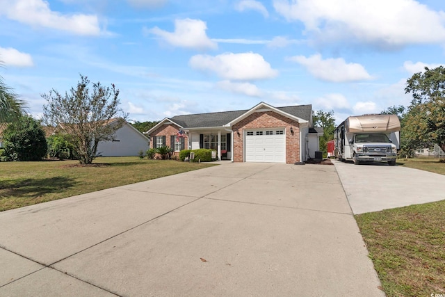 ranch-style home featuring a garage and a front lawn