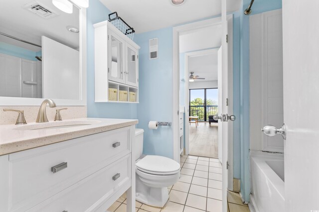 full bathroom with tile patterned flooring, toilet, ceiling fan, shower / bathing tub combination, and vanity