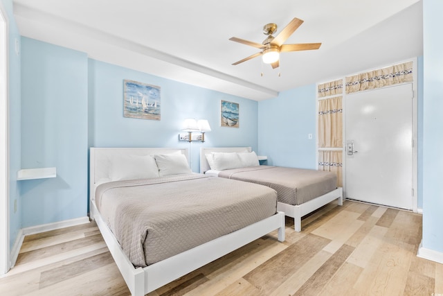 bedroom featuring ceiling fan and light hardwood / wood-style floors