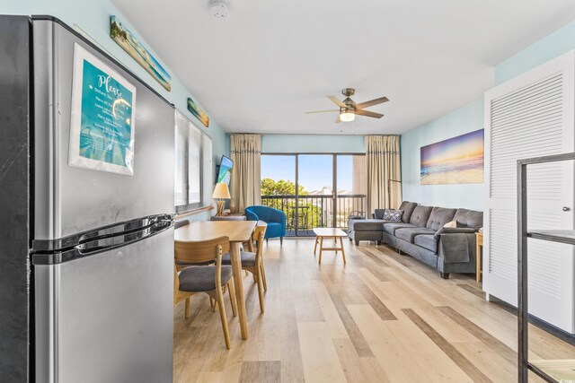 interior space featuring ceiling fan and light hardwood / wood-style floors