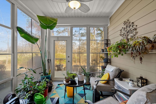 sunroom / solarium with ceiling fan