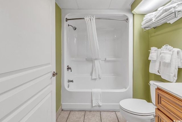 full bathroom featuring vanity, toilet, tile patterned floors, and shower / bath combination with curtain