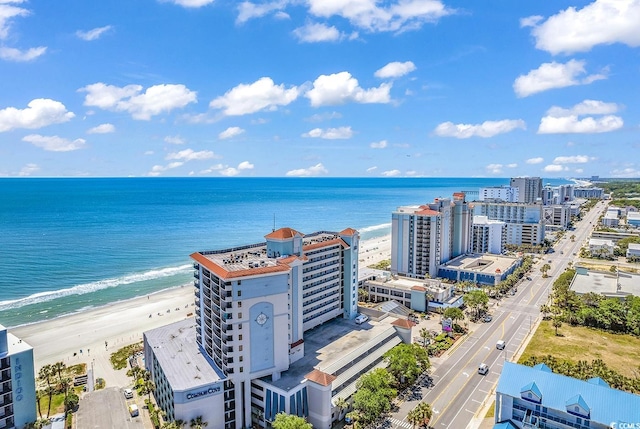 aerial view with a view of the beach and a water view