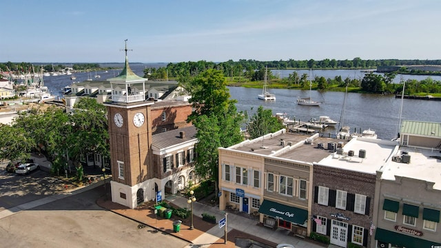 birds eye view of property with a water view