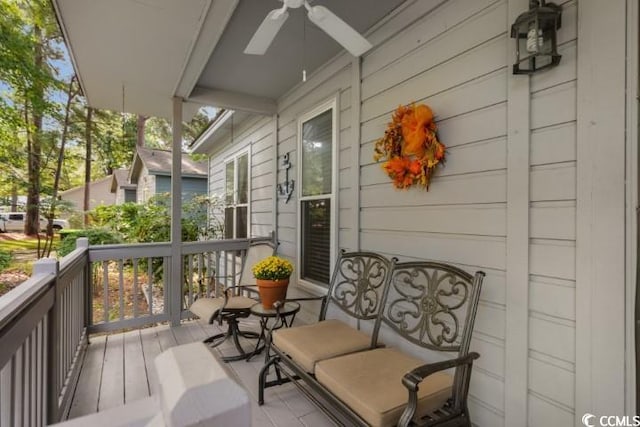 balcony featuring ceiling fan