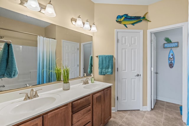 bathroom with vanity and tile patterned floors