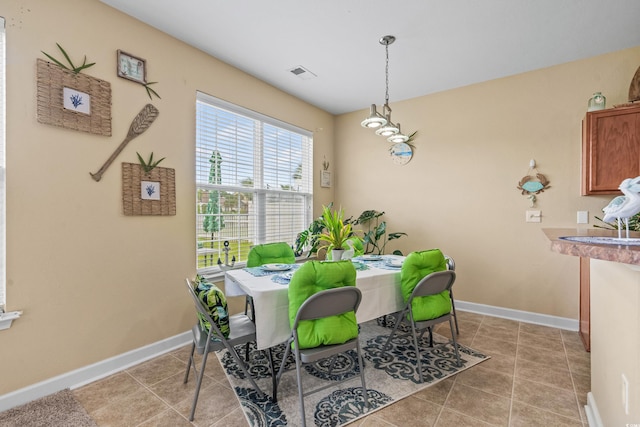 view of tiled dining room