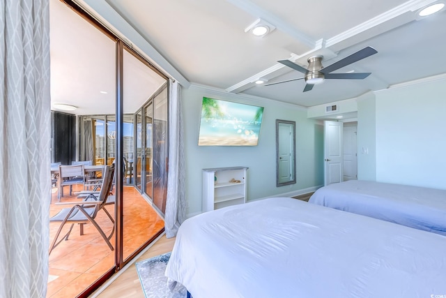 bedroom featuring light hardwood / wood-style flooring, ceiling fan, and ornamental molding