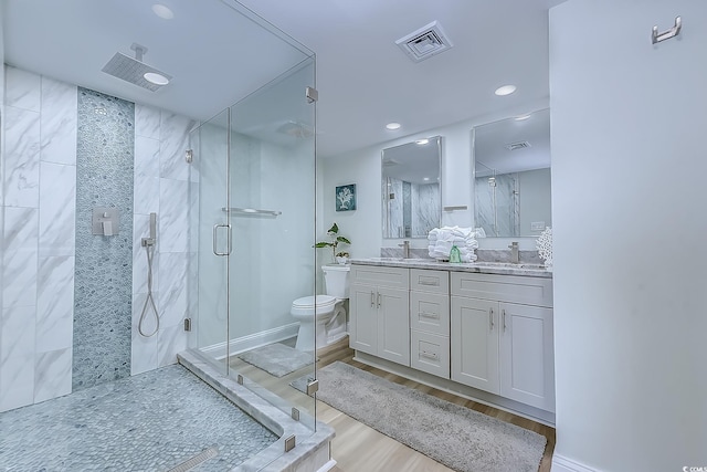 9650 Shore Dr Unit 902, Myrtle Beach, SC 29572 - bathroom featuring visible vents, a sink, and a shower stall
