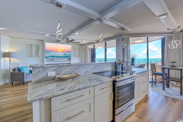 kitchen featuring a water view, white cabinets, ceiling fan, light hardwood / wood-style flooring, and electric range