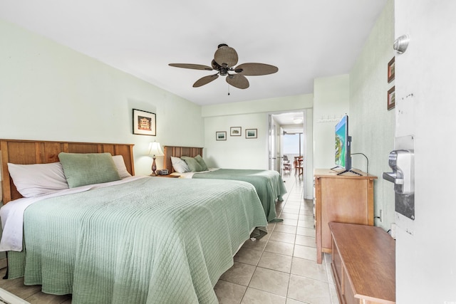 bedroom featuring ceiling fan and light tile patterned floors