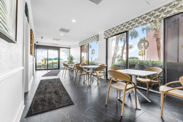 2500 N Ocean Blvd Unit 605, Myrtle Beach, SC 29577 - sunroom with recessed lighting, visible vents, and crown molding