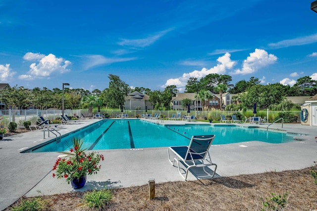 view of pool featuring a patio area