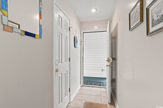 interior space with light tile patterned floors