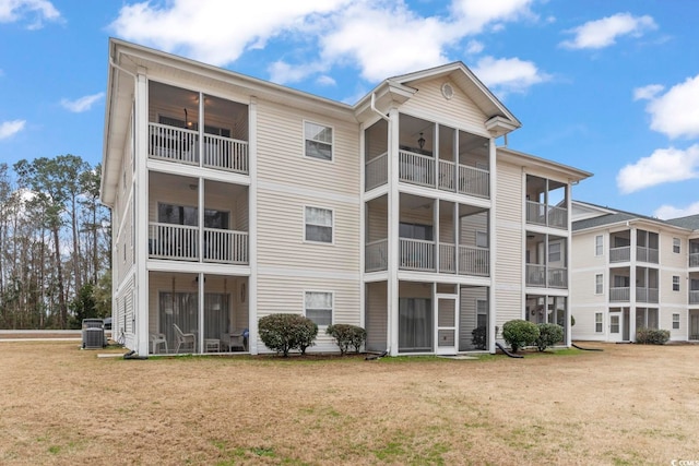 view of building exterior featuring central AC unit