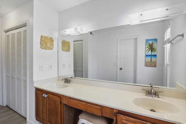 bathroom featuring vanity and hardwood / wood-style floors