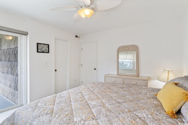 bedroom featuring access to outside and ceiling fan