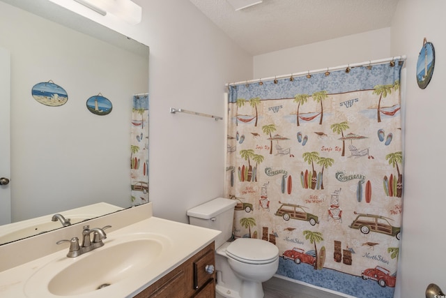 bathroom with wood-type flooring, a textured ceiling, a shower with shower curtain, vanity, and toilet