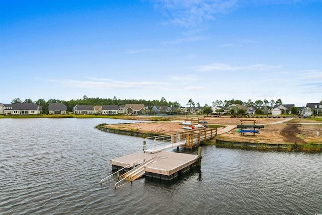 dock area with a water view