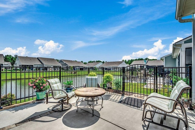 view of patio / terrace with a water view