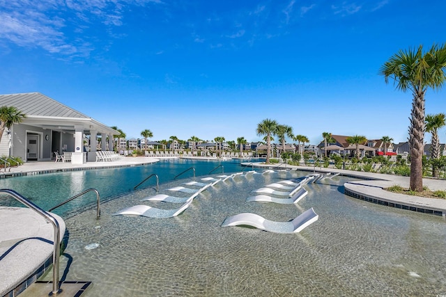 view of pool featuring a patio