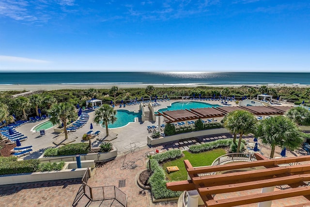 aerial view with a beach view and a water view