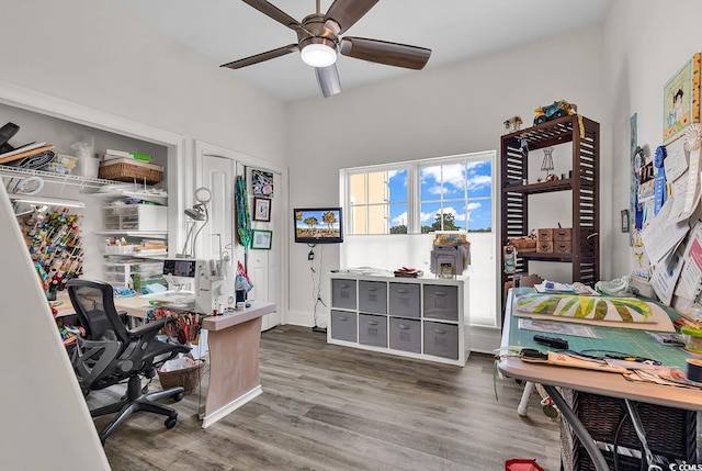 office area with wood finished floors and ceiling fan