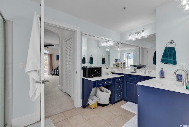 full bath featuring tile patterned floors and vanity