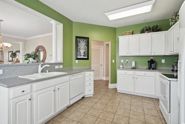 kitchen featuring white appliances, ornate columns, sink, white cabinetry, and light tile patterned flooring