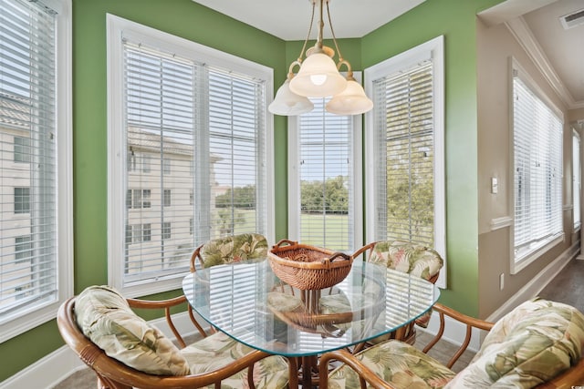 dining area featuring ornamental molding