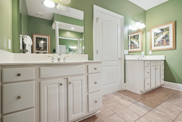 bathroom featuring vanity and tile patterned flooring