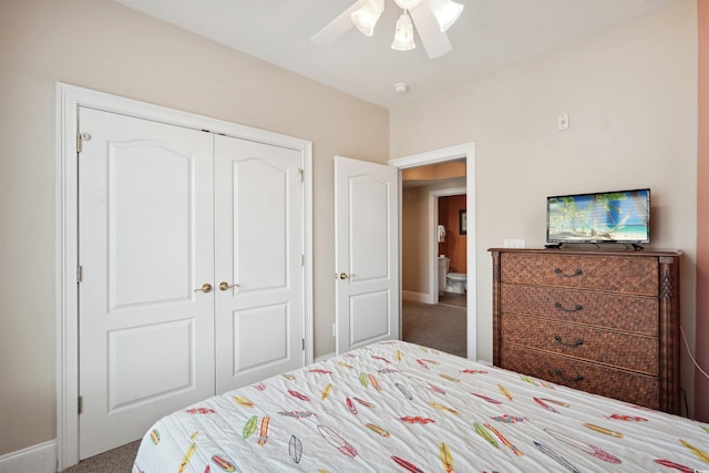 carpeted bedroom featuring ceiling fan and a closet