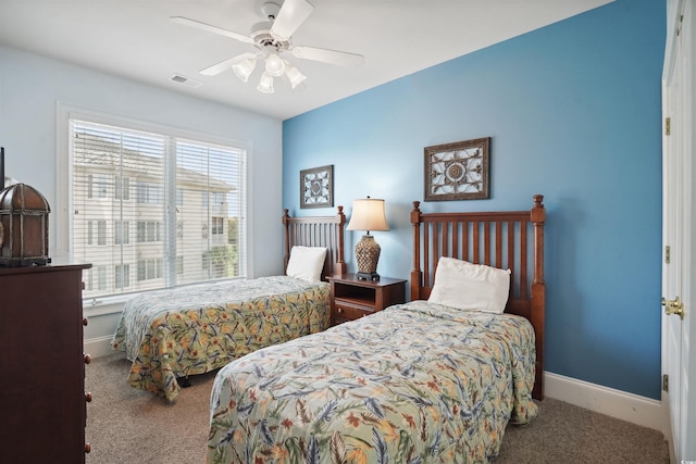 bedroom featuring ceiling fan and carpet floors