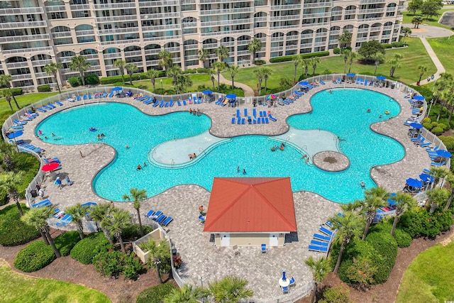 view of swimming pool featuring a patio