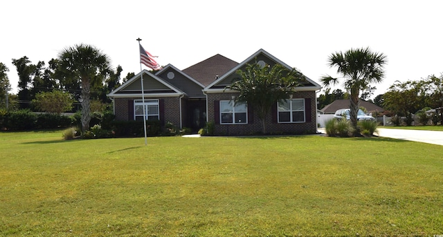 view of front facade featuring a front yard