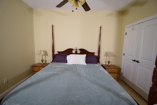 bedroom with ceiling fan and a closet