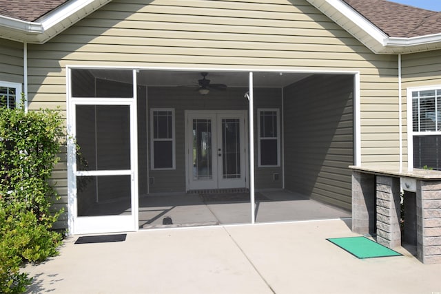 doorway to property with a patio and ceiling fan