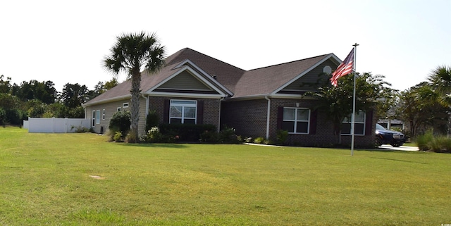 view of front of home with a front lawn