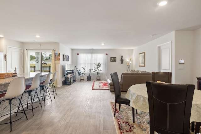 interior space with light wood-type flooring and a wealth of natural light