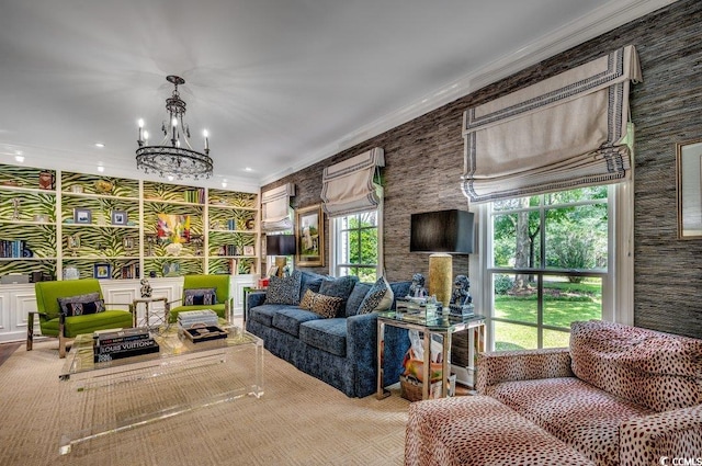 living room with a chandelier and crown molding