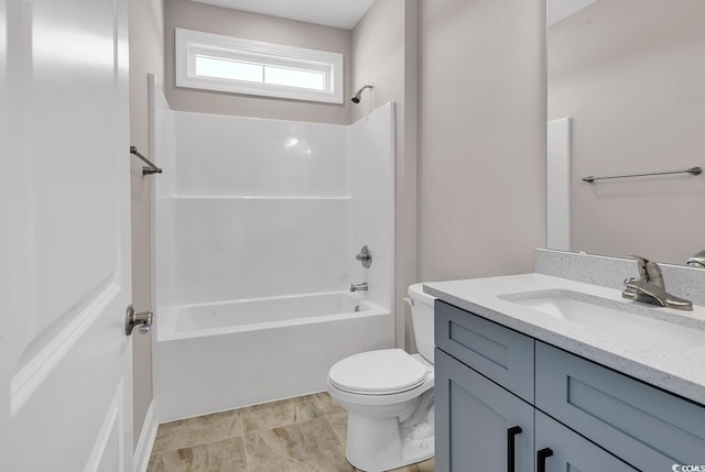 full bathroom with vanity, toilet, and washtub / shower combination