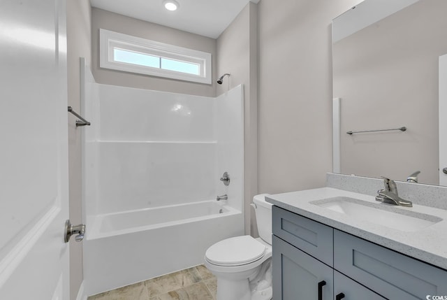 full bathroom with shower / washtub combination, toilet, and vanity