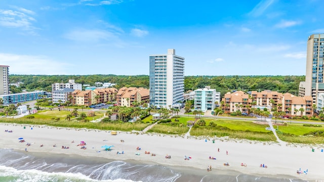 aerial view featuring a water view and a view of the beach