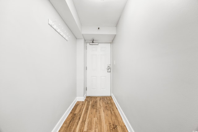 hallway featuring light hardwood / wood-style floors