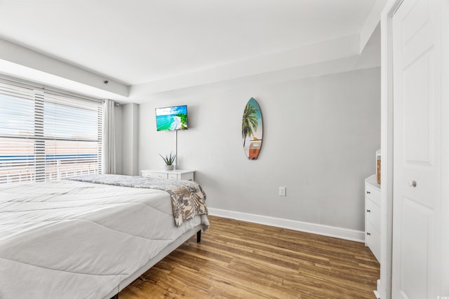 bedroom featuring wood-type flooring