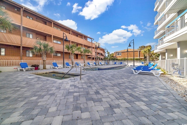 view of pool featuring a patio