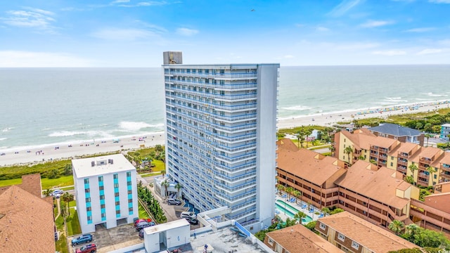 bird's eye view with a view of the beach and a water view