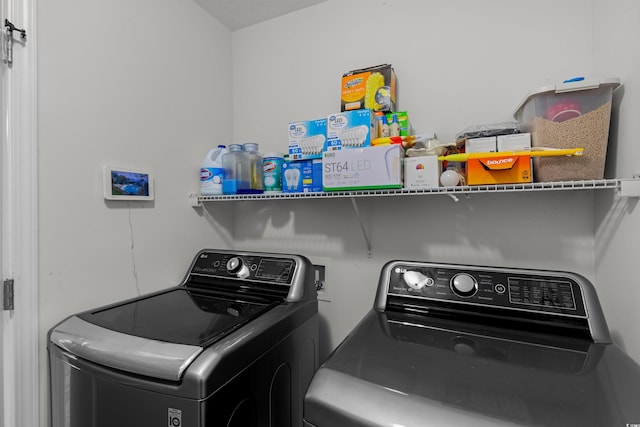 laundry room featuring washer and dryer