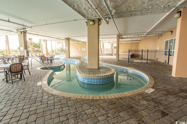 view of pool with a patio